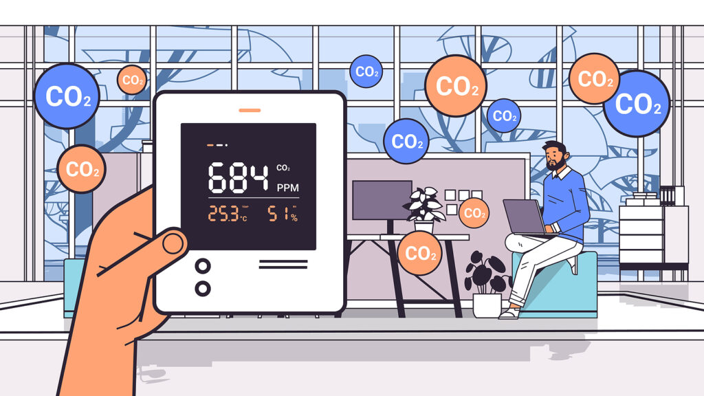 hand holding air quality monitor test on the presence of dangerous CO2 control level testing with indoor carbon dioxide detector